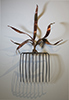 Ten Tine, 2024, 40"x 32"x12", found object and bronze